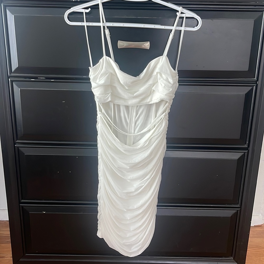 White bodycon dress with cut out detail
